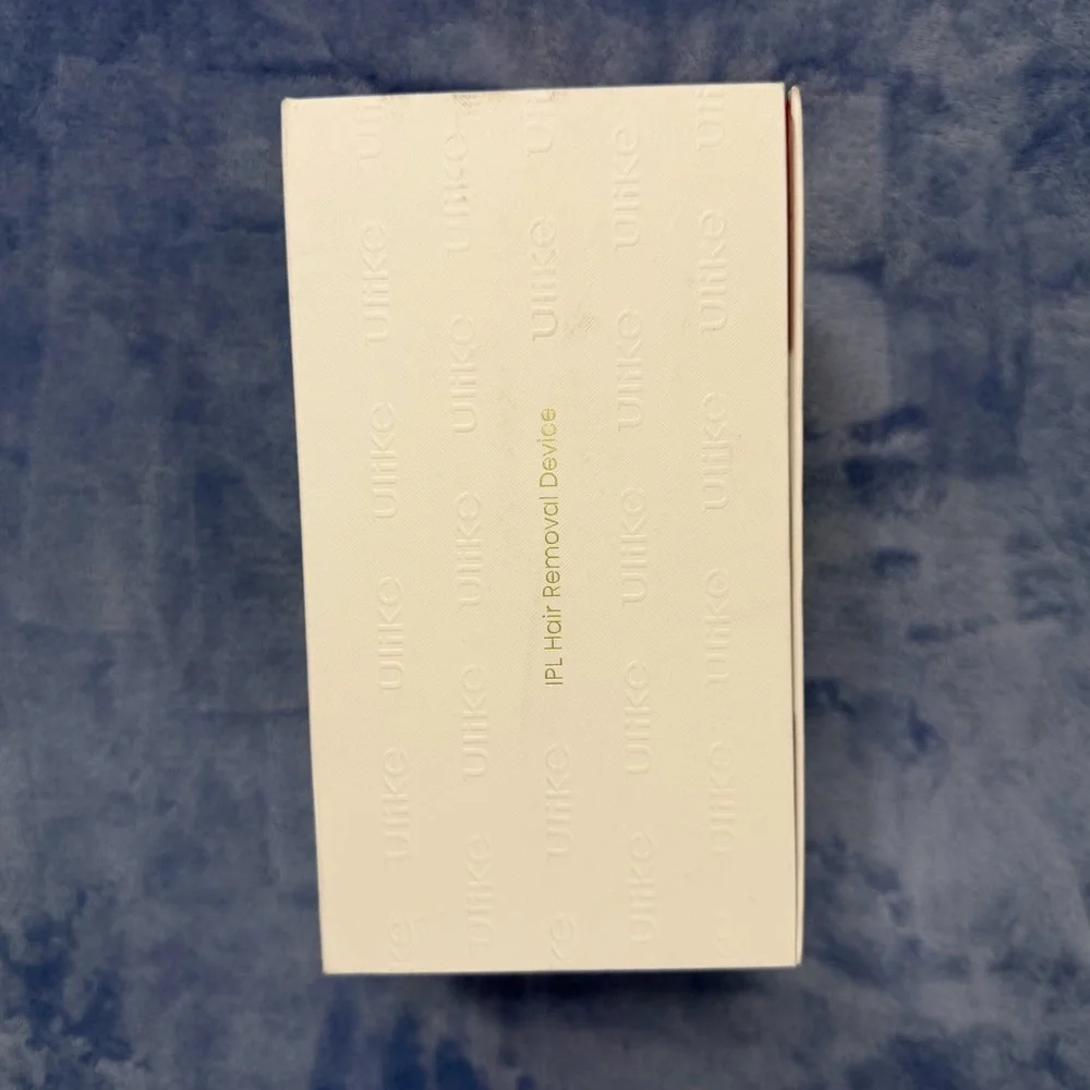 Ulike hair removal White Handheld Device in Original Box used 1 time‎